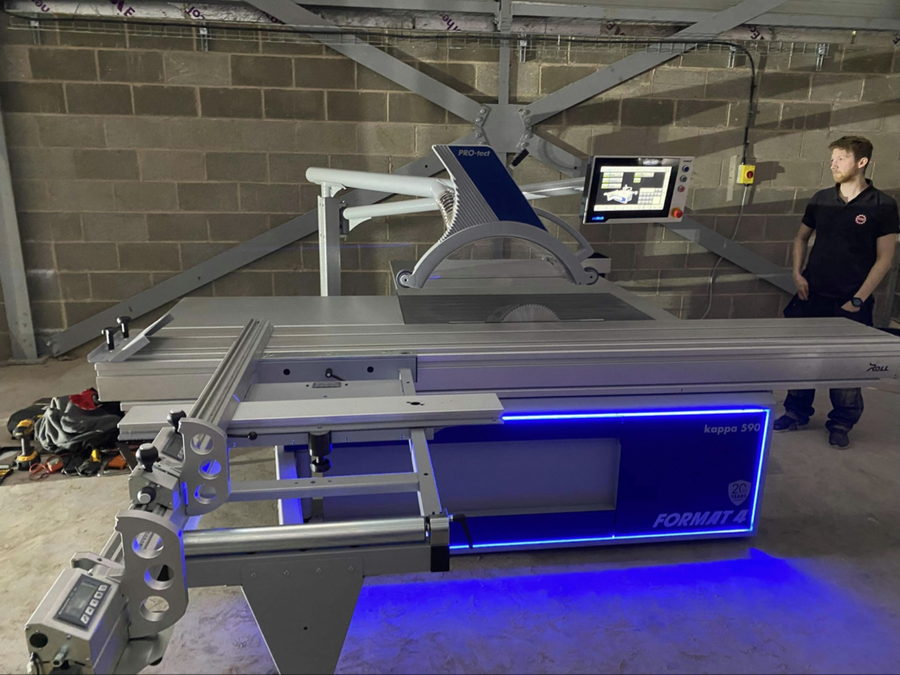 The sliding table panel saw, lit up and ready