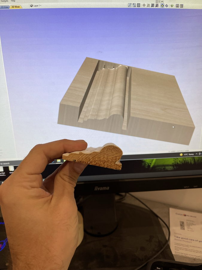 The machined sample held against its own drawing