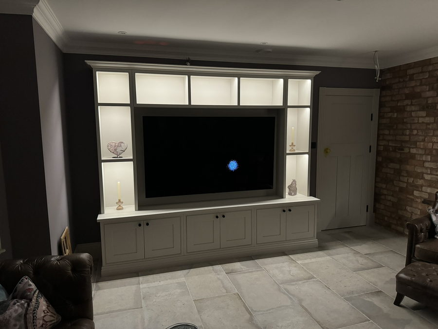 Lit display niches around the television