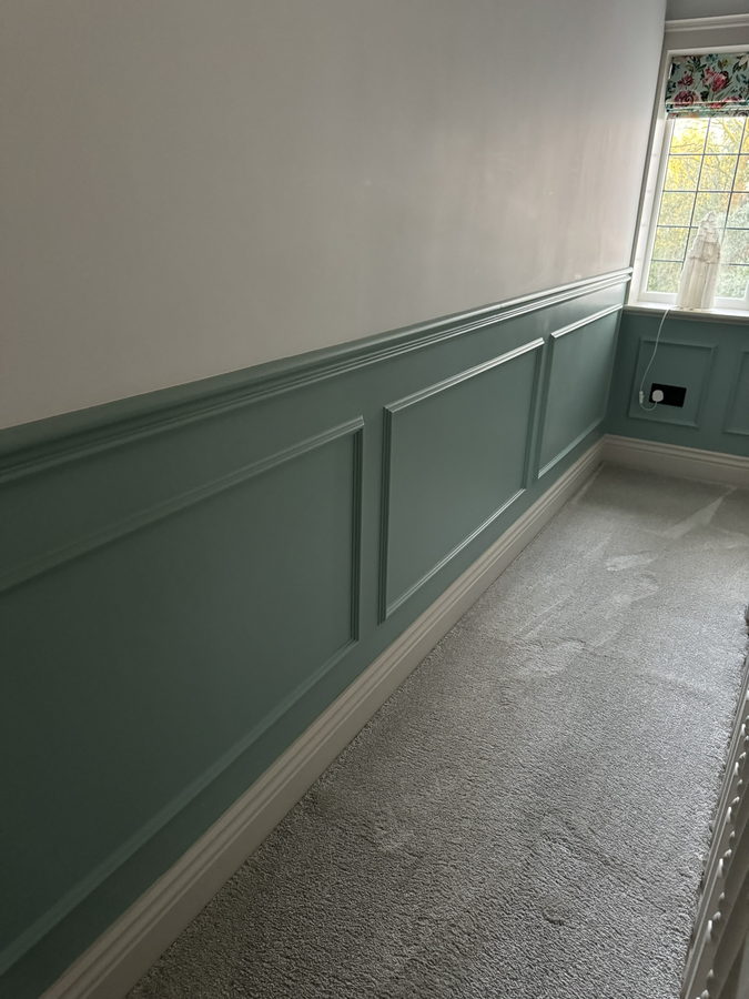 Shaker panelling to dado height along a landing