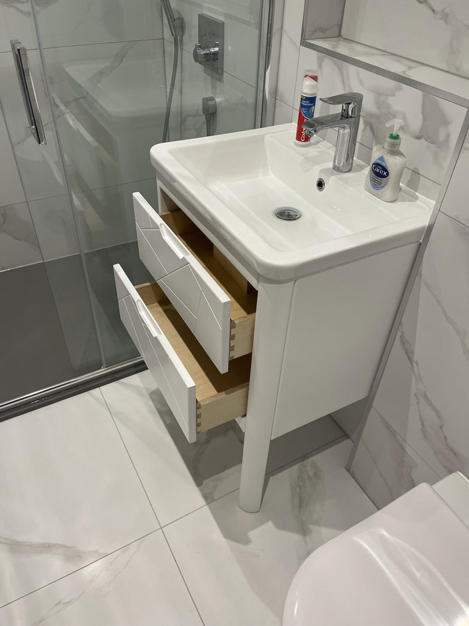 Solid oak drawer boxes inside the painted vanity