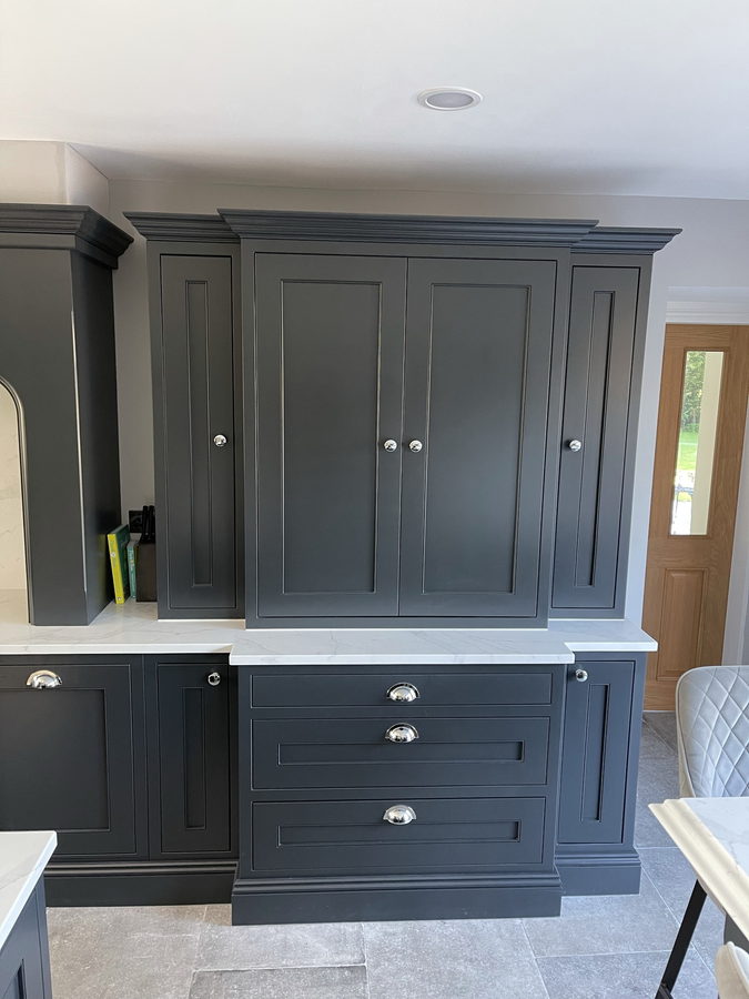 Charcoal larders either side of a dresser run