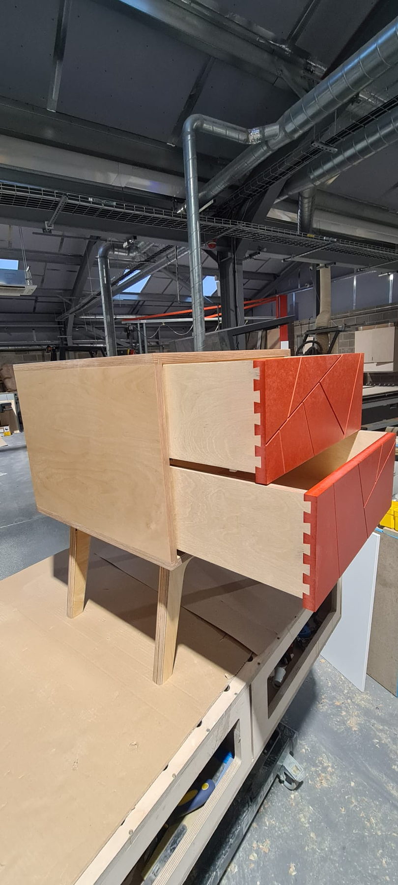 A birch ply drawer carcass with machine-cut joints, going together