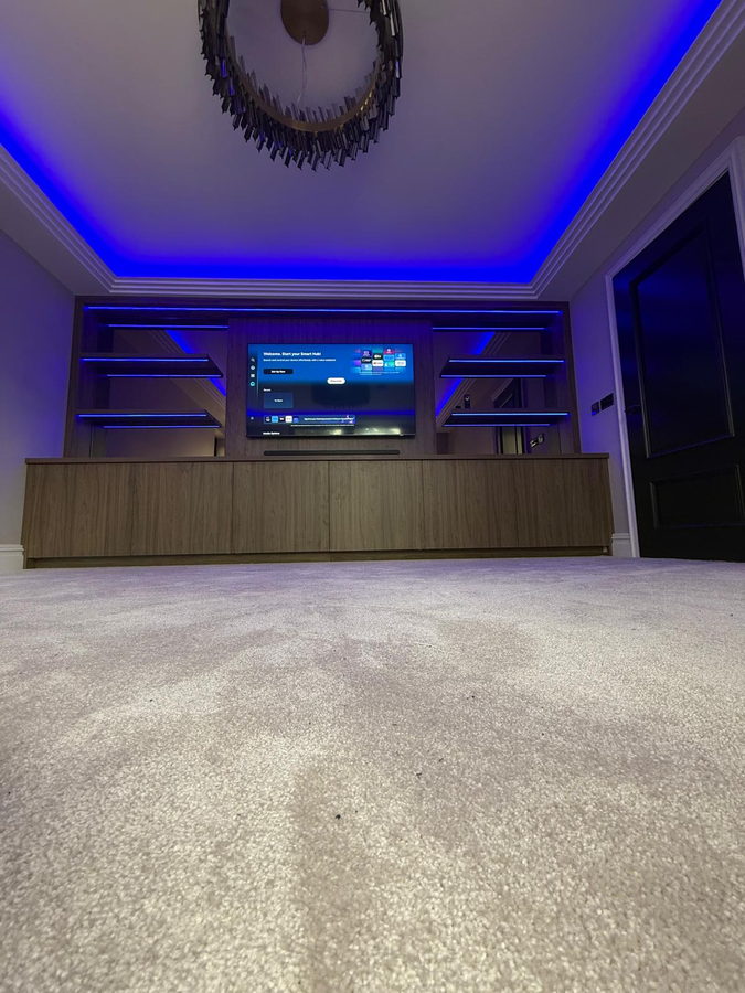 Walnut veneer and LED cove lighting in the same room
