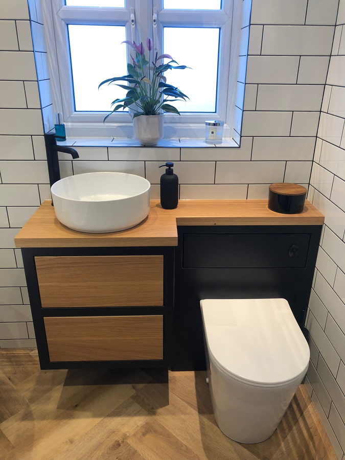 The basin run with a black frame and metro tiling