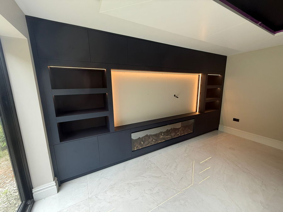 Open shelves, an LED-lit recess and a linear fire