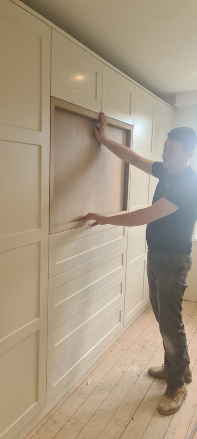 Offering up a panelled wardrobe door on site