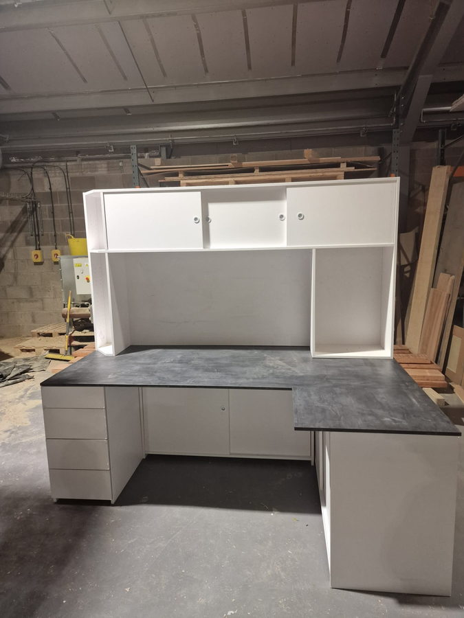 Desk units and a hutch dry-fitted in the workshop