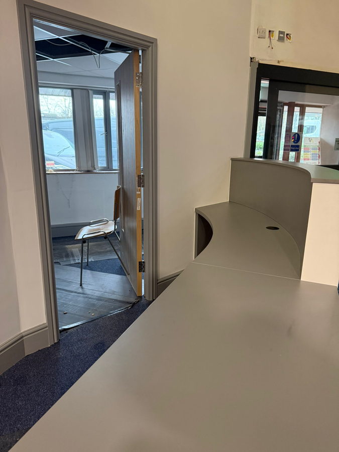 The same desk with the glazed partitions in