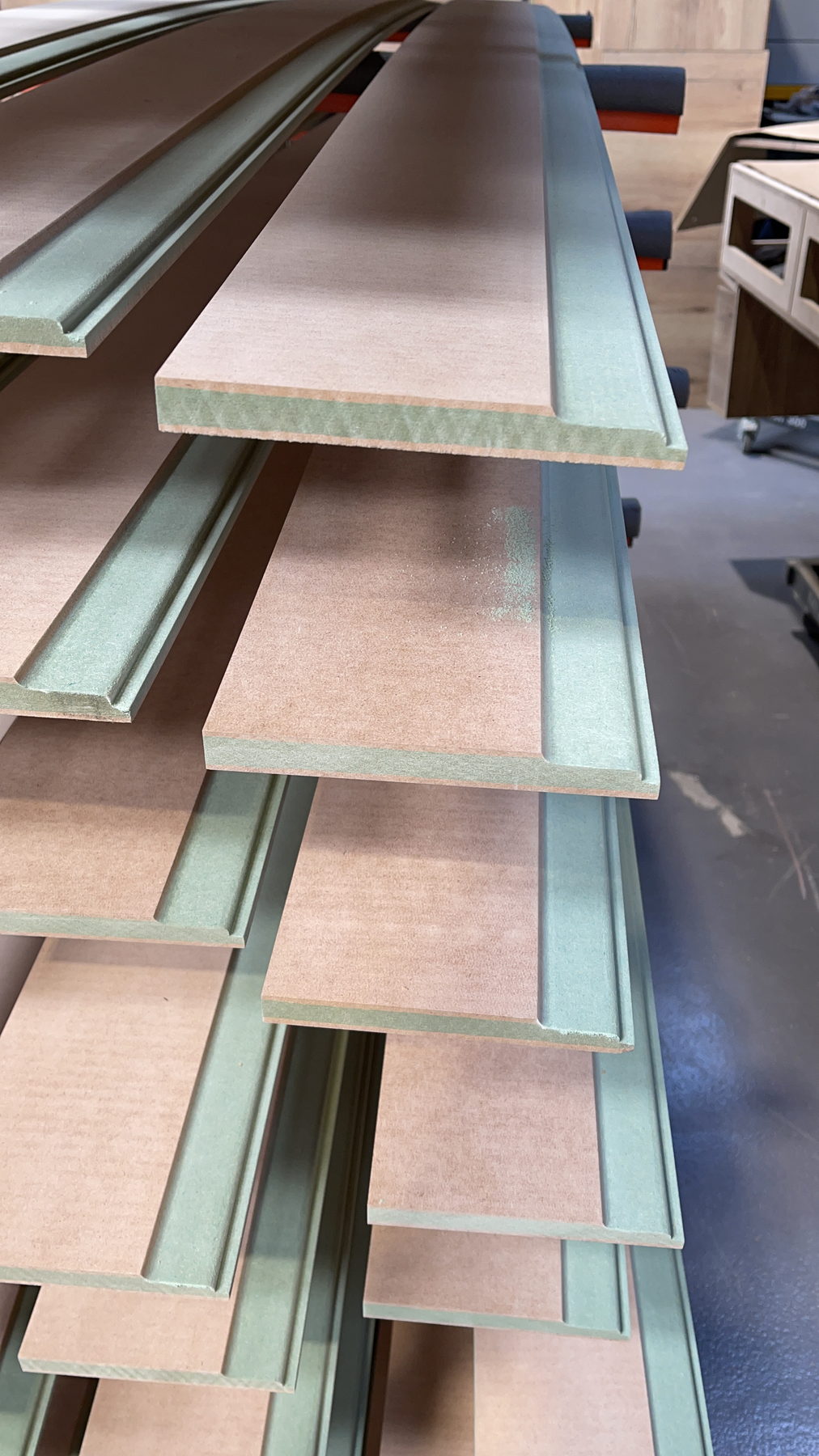 Cut parts in moisture-resistant board, stacked for edging