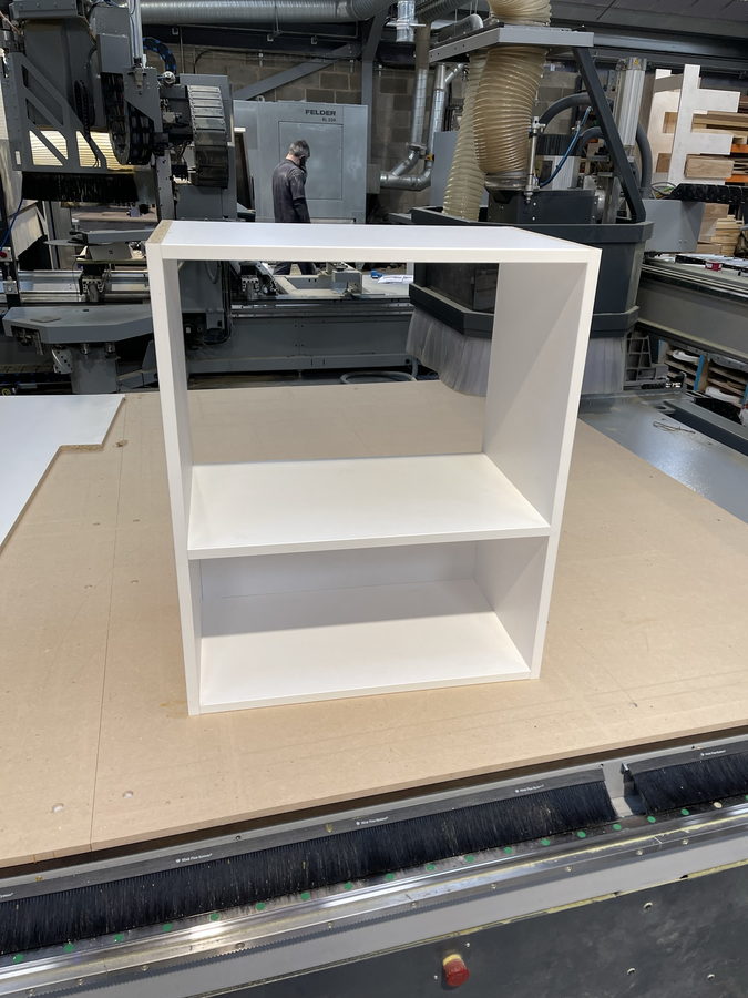 A carcass straight off the machine, drilled and ready to build