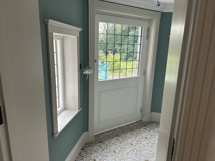 A panelled window reveal and dado in the same room
