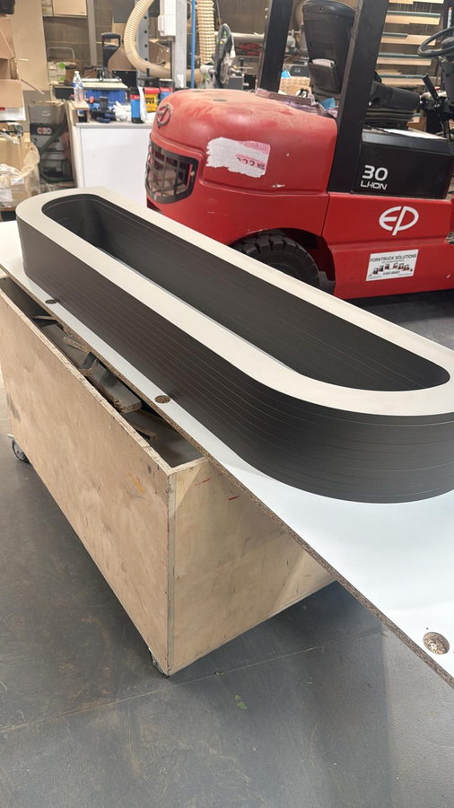 Curved reception counter section built in the workshop